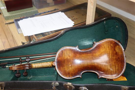 A late 19th / early 20th century Boosey & Co full size violin, cased with 2 bows